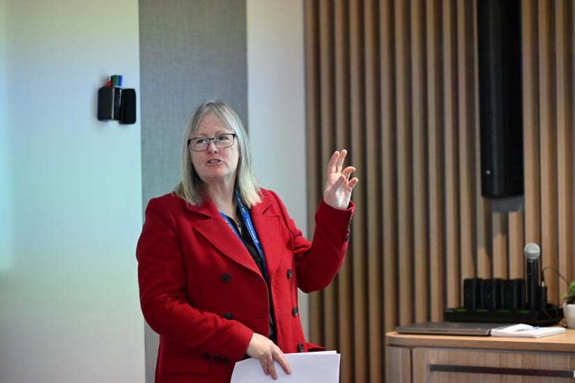 Merrilee speaking at Research Cafe