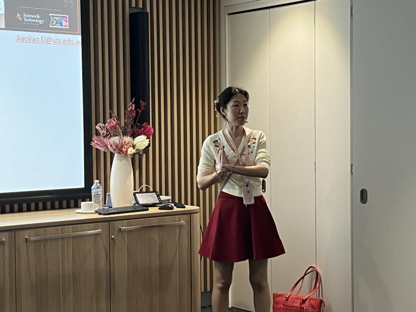 Jiao Jiao Li speaking at research cafe