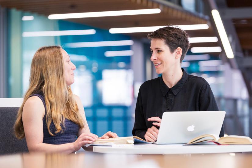 Two researchers talking